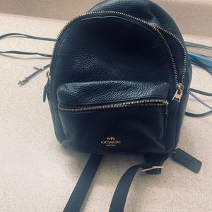 Beautiful small coach book bag good condition gently used no rip no tears